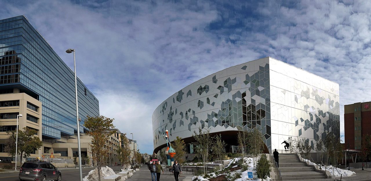 The Calgary Central Library's geometric faceted facade in the East Village