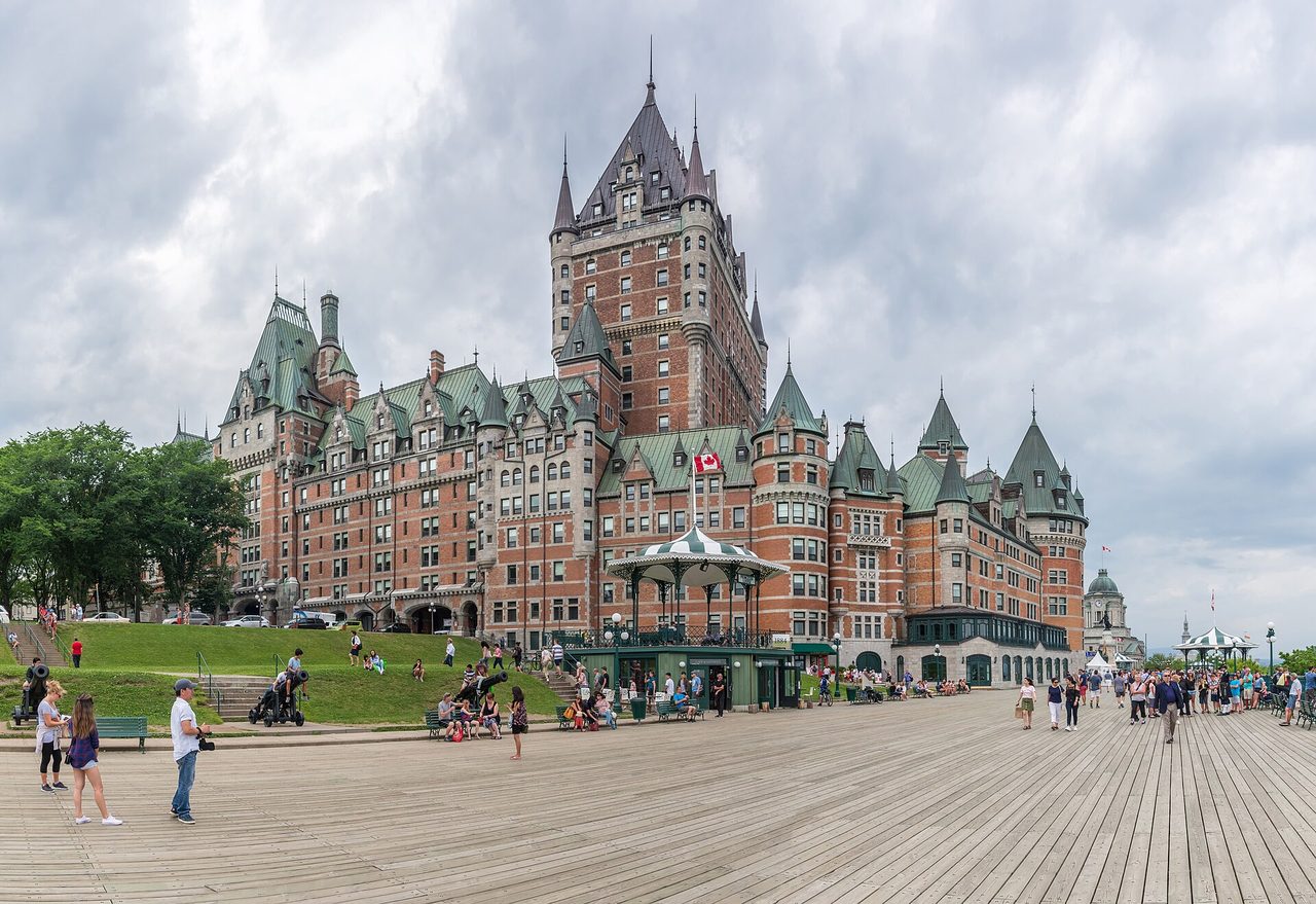 Fairmont Le Château Frontenac rising above the Dufferin Terrace boardwalk in Old Quebec City