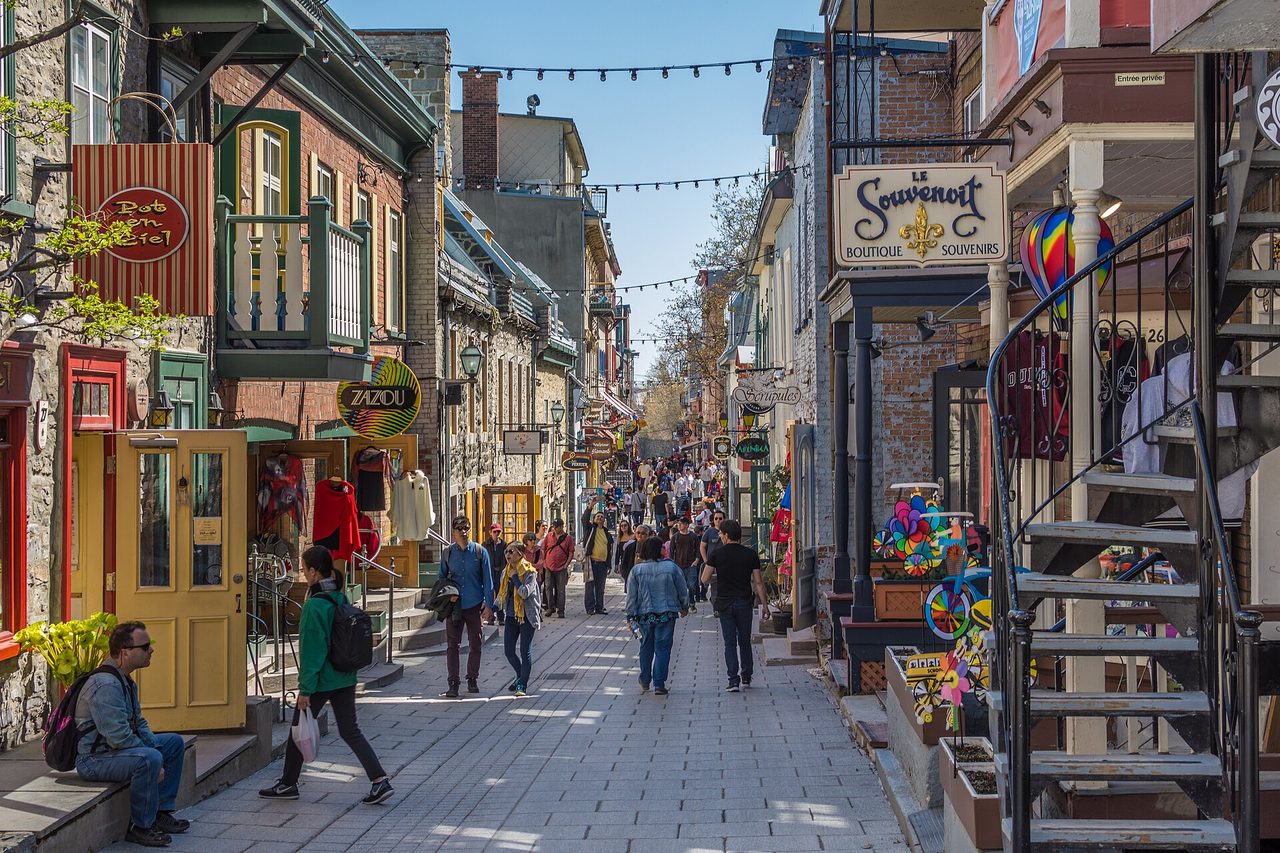 Colorful historic buildings and boutiques lining Rue du Petit-Champlain in Lower Town