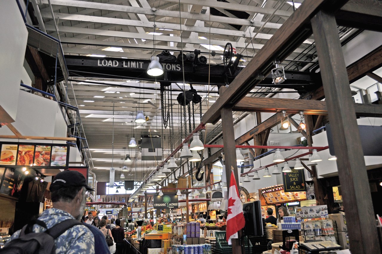 Busy food stalls inside the Granville Island Public Market