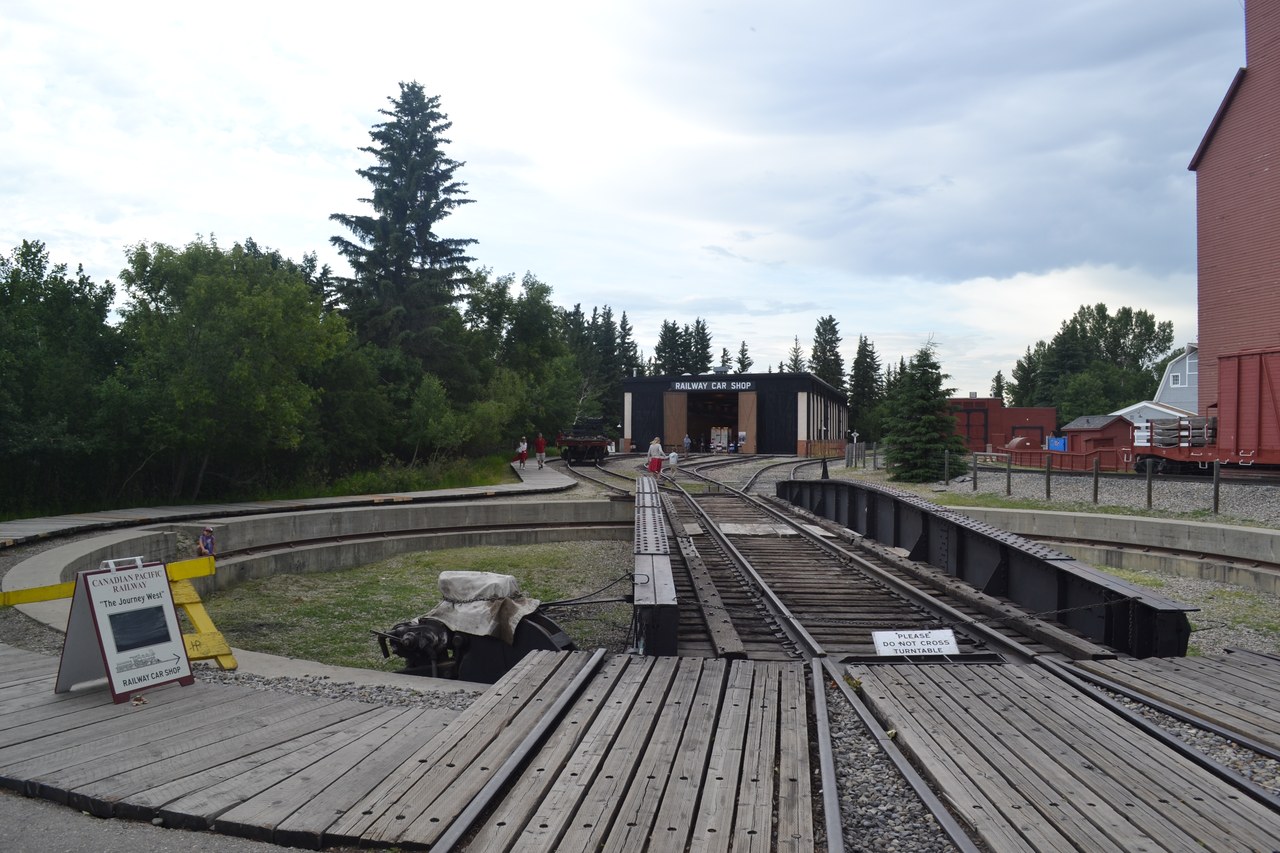 The Railway Car Shop and vintage rail tracks at Heritage Park Historical Village