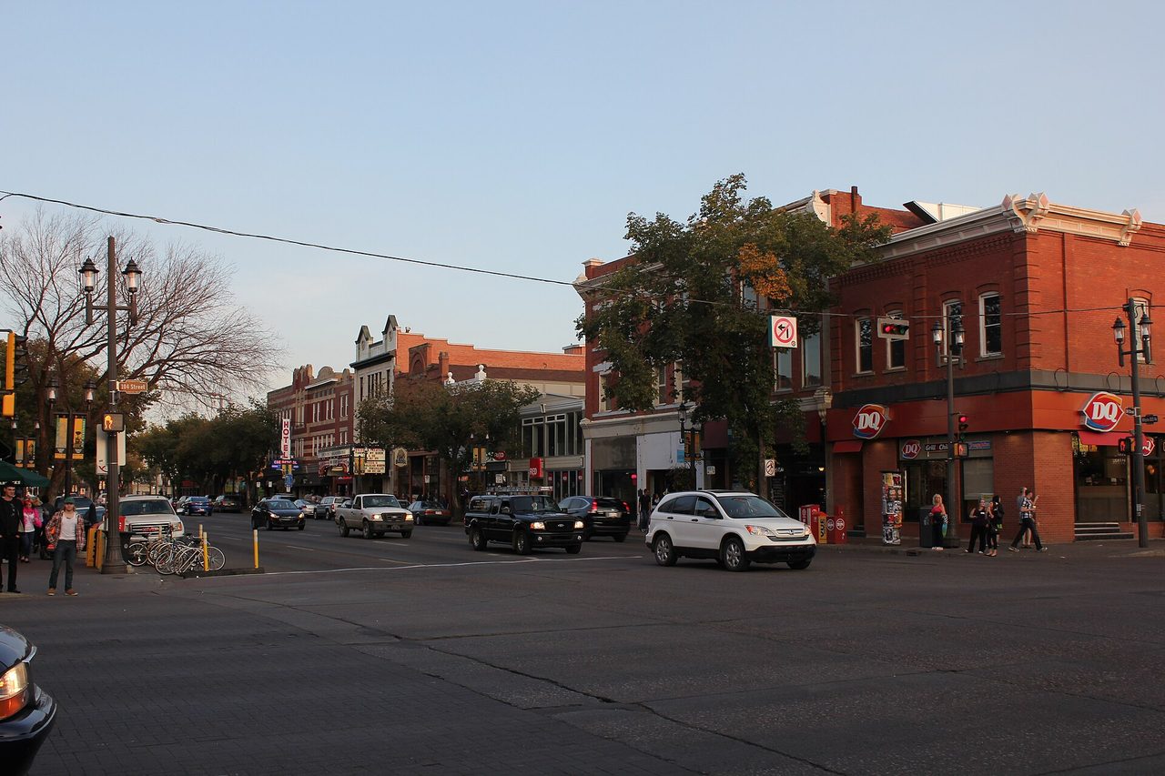 Historic brick storefronts along Whyte Avenue in Old Strathcona, Edmonton