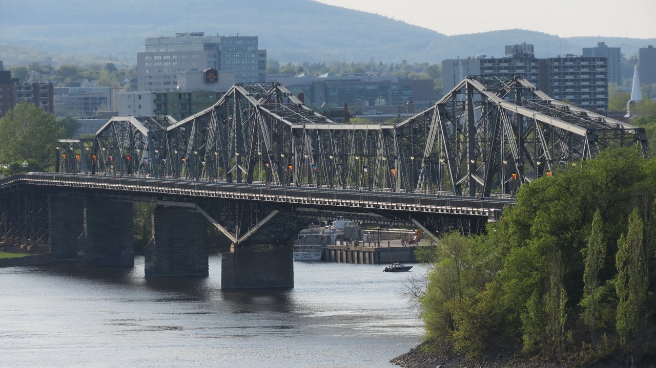 The Alexandra Bridge's steel trusses spanning the Ottawa River between Ottawa and Gatineau