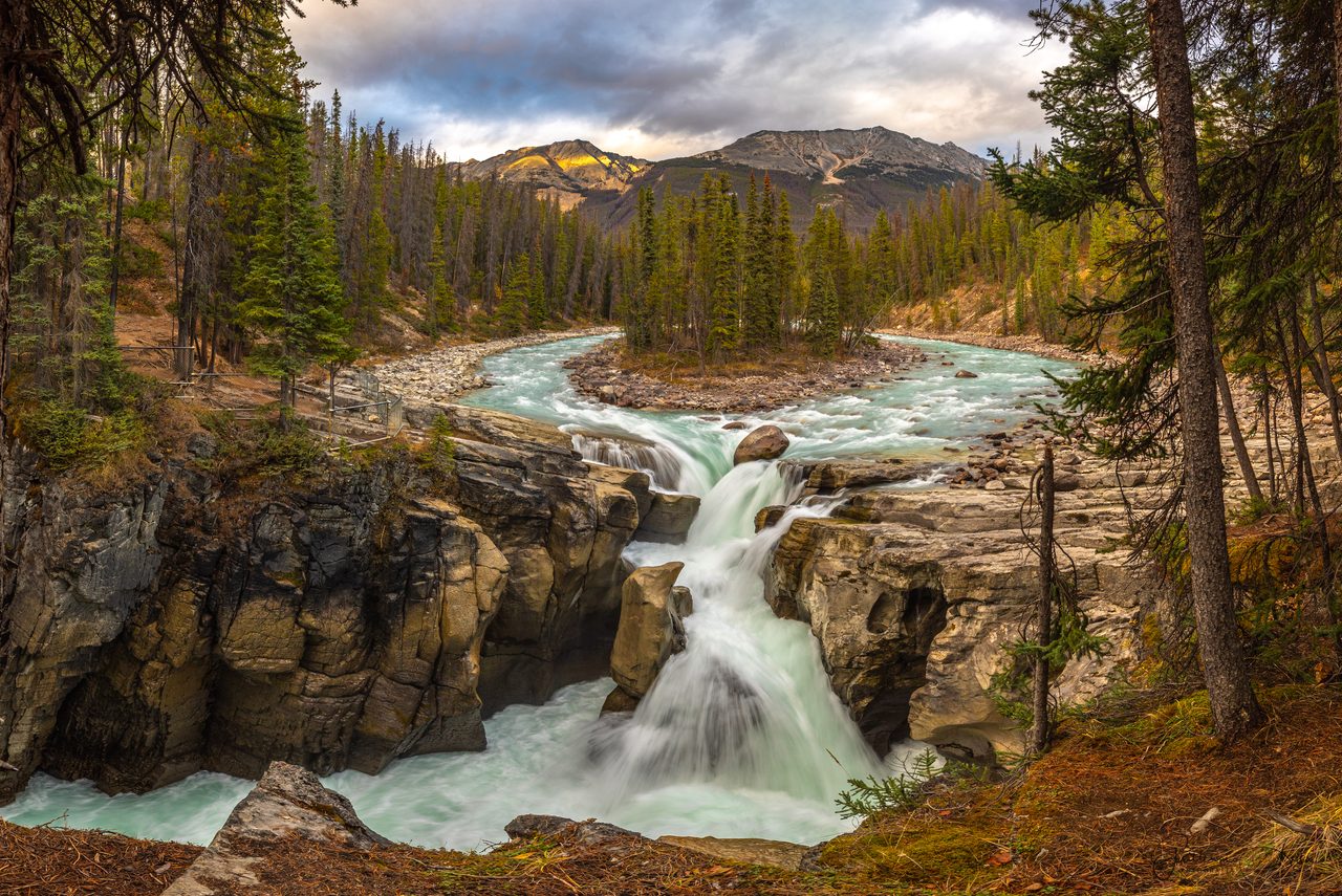 Sunwapta Falls cascading at sunset in Jasper National Park