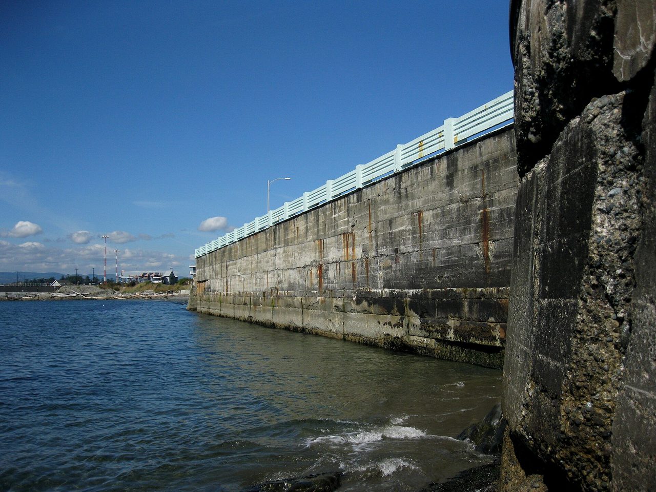 The Dallas Road waterfront walkway in Victoria seen from water level