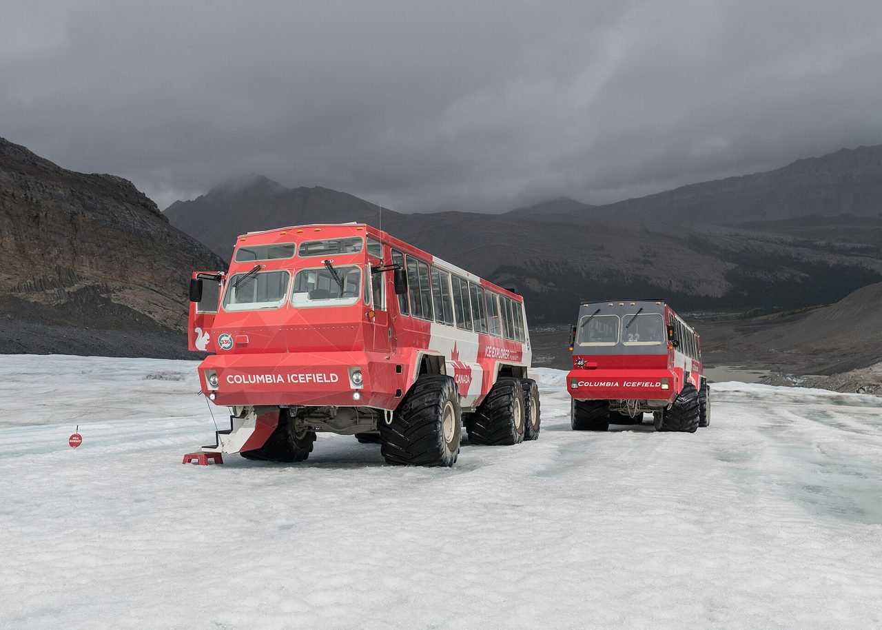 Ice Explorer vehicles driving on the Athabasca Glacier at the Columbia Icefield