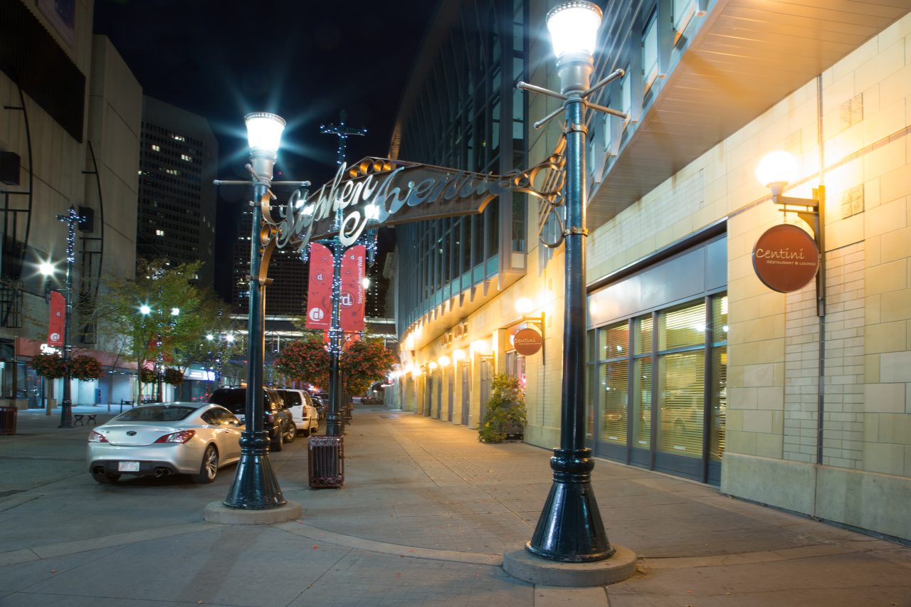 Historic sandstone buildings and pedestrians on the Stephen Avenue pedestrian mall in Calgary