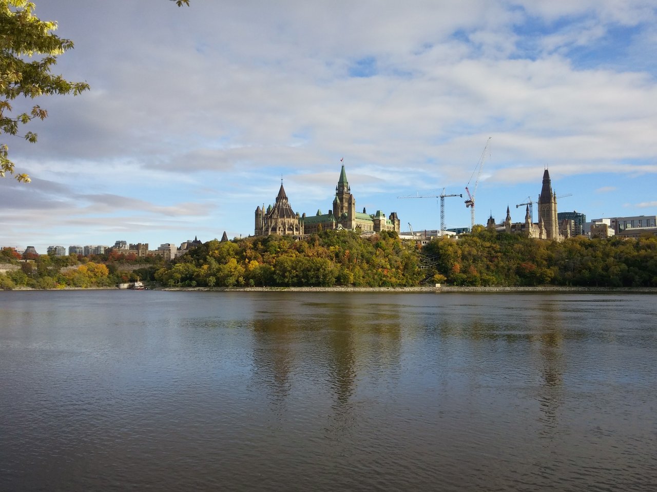 Parliament Hill in Ottawa seen from the Voyageurs Pathway on the Gatineau riverfront