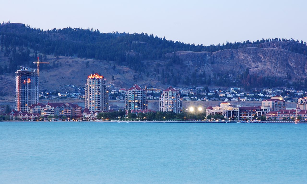 Kelowna skyline along the shore of Okanagan Lake on a clear day