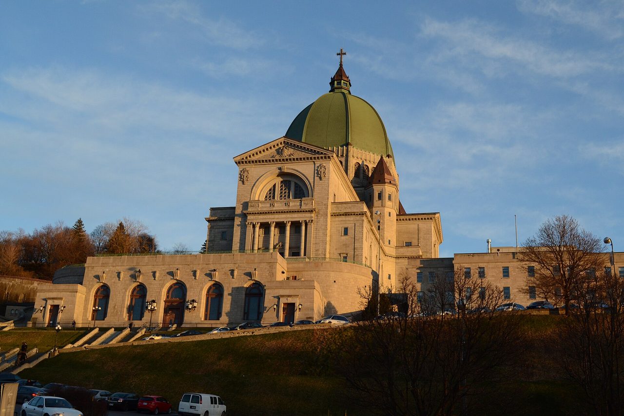 The copper dome of Saint Joseph's Oratory rising above Mount Royal's western slope