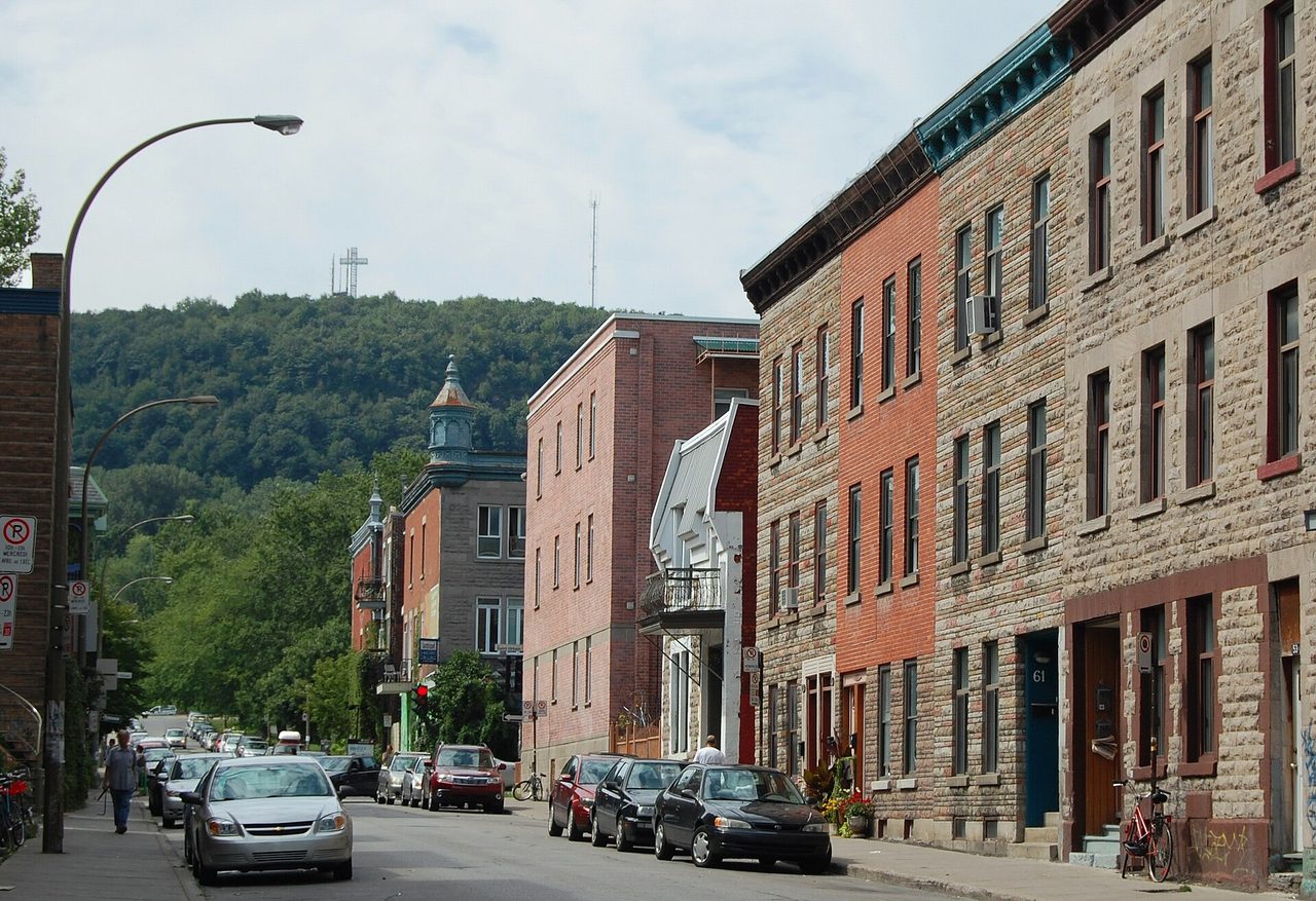 Colorful Plateau Mont-Royal houses with exterior staircases near Clark and Duluth streets