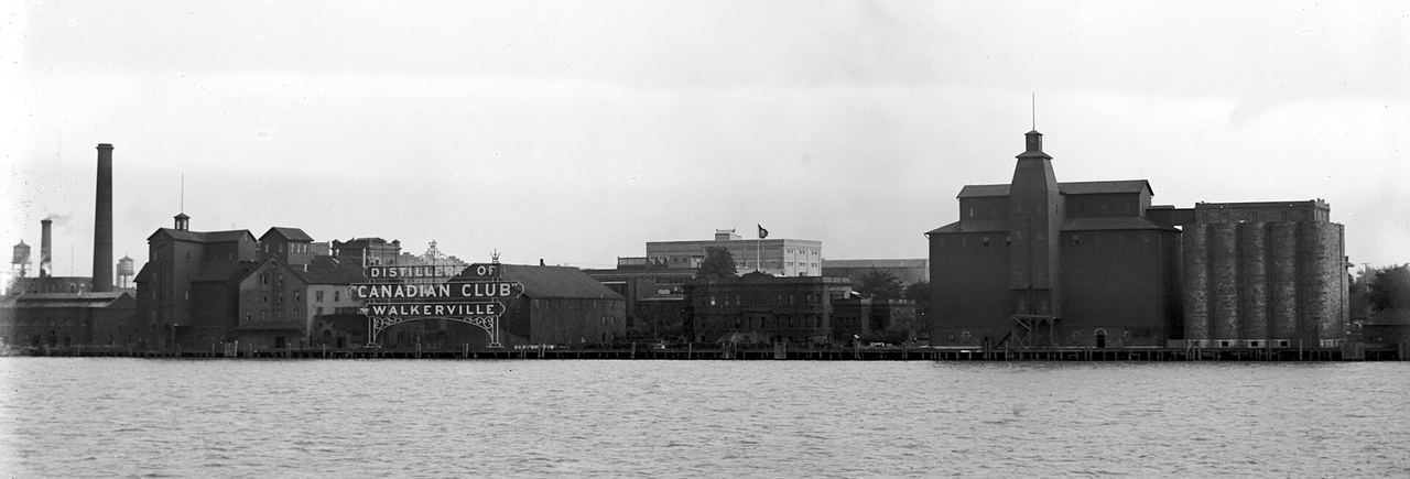 A historic early-1900s photograph of the Hiram Walker distillery buildings in Walkerville, Windsor, Ontario