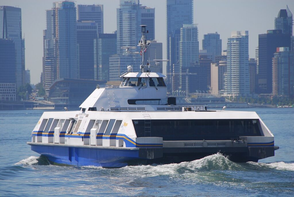 SeaBus ferry crossing Vancouver harbour with the downtown skyline behind