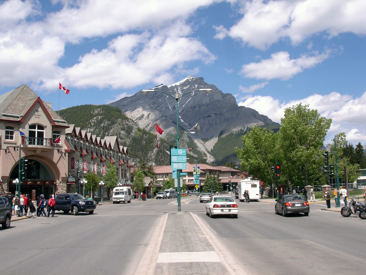 Banff Avenue in the Banff townsite with Cascade Mountain rising behind the shops