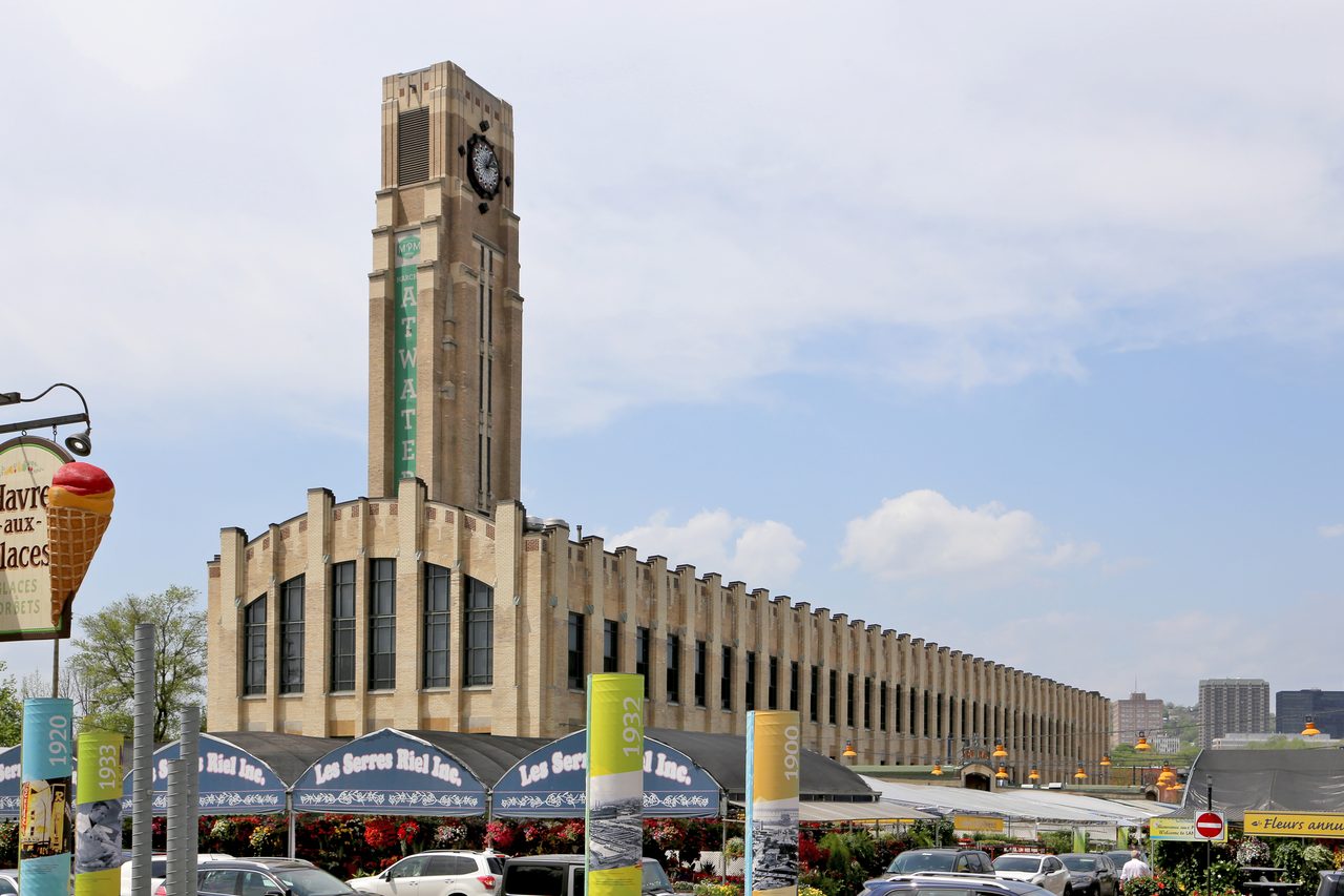 Art deco facade of Marché Atwater with its clock tower near Little Burgundy