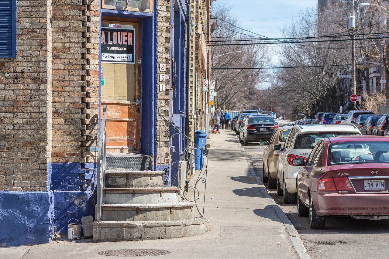 Avenue Cartier in Montcalm with restaurants, shops, and leafy trees lining the street