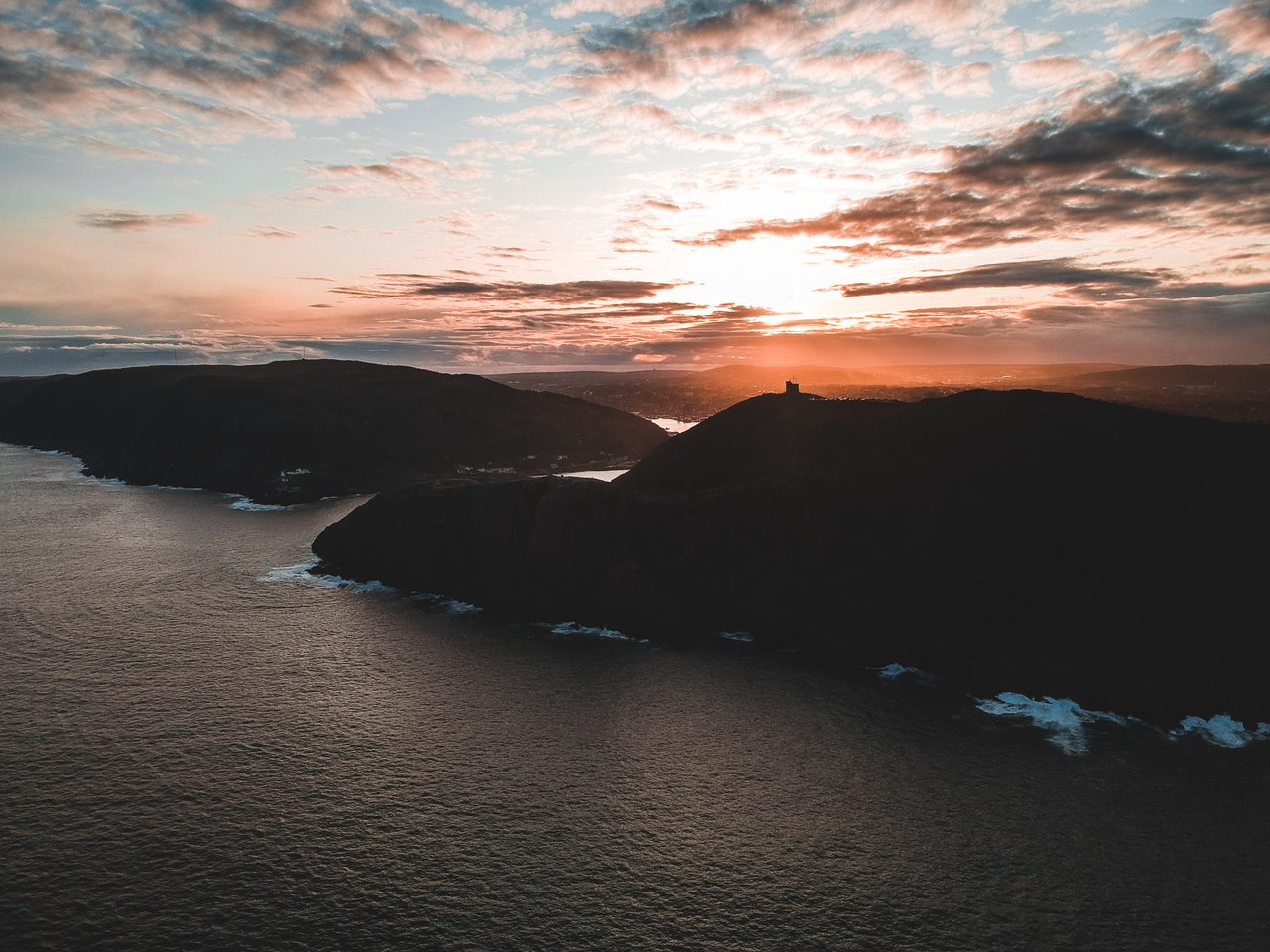 Aerial view of Signal Hill and the St. John's harbour at sunset