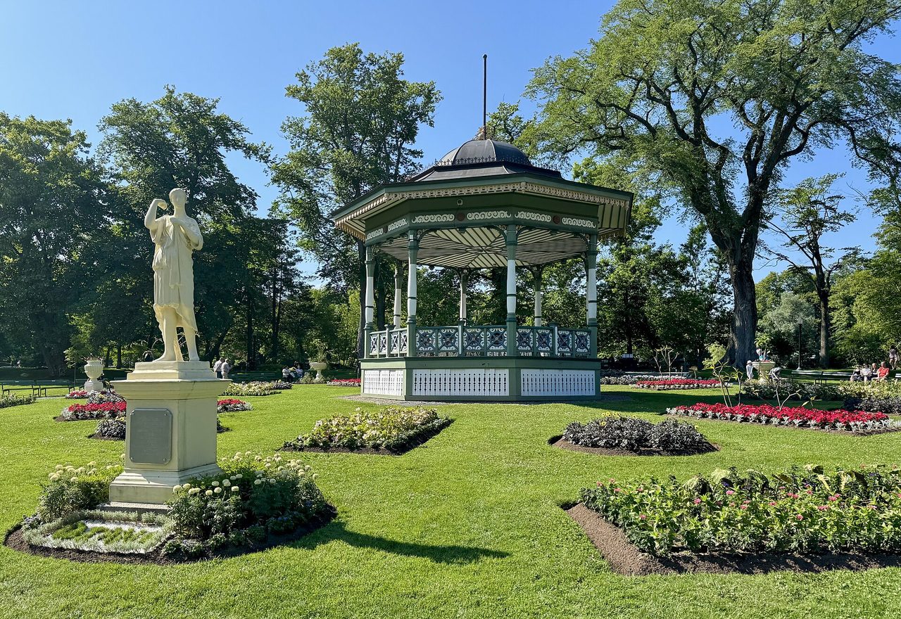 Flower beds and lawns inside the Halifax Public Gardens on a summer day