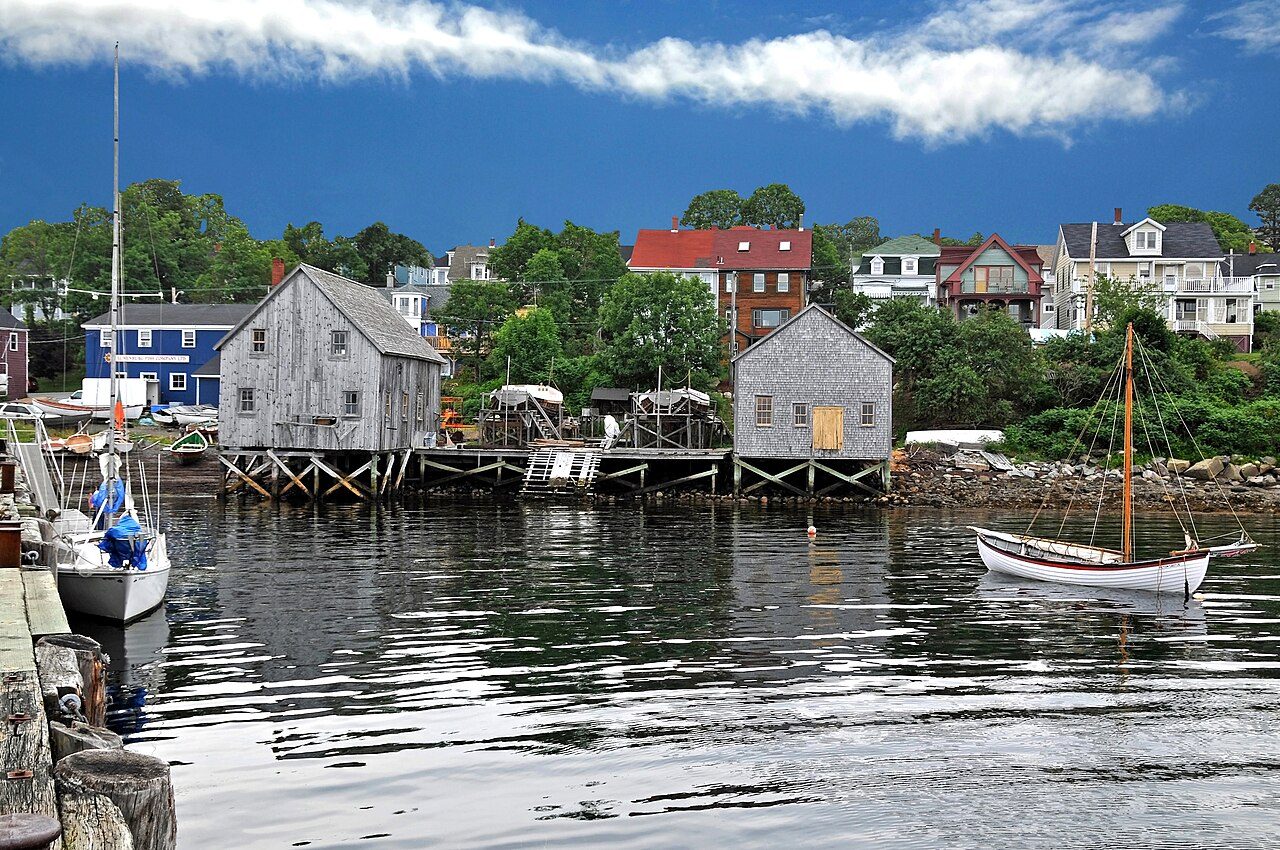 Historic wooden boat houses and fishing dories along Lunenburg's working waterfront