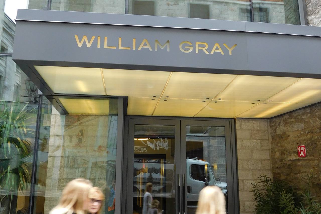 Hotel William Gray's stone and glass facade in Old Montreal