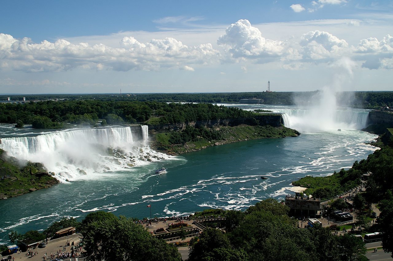 Horseshoe Falls thundering over the crest with mist rising at Niagara Falls