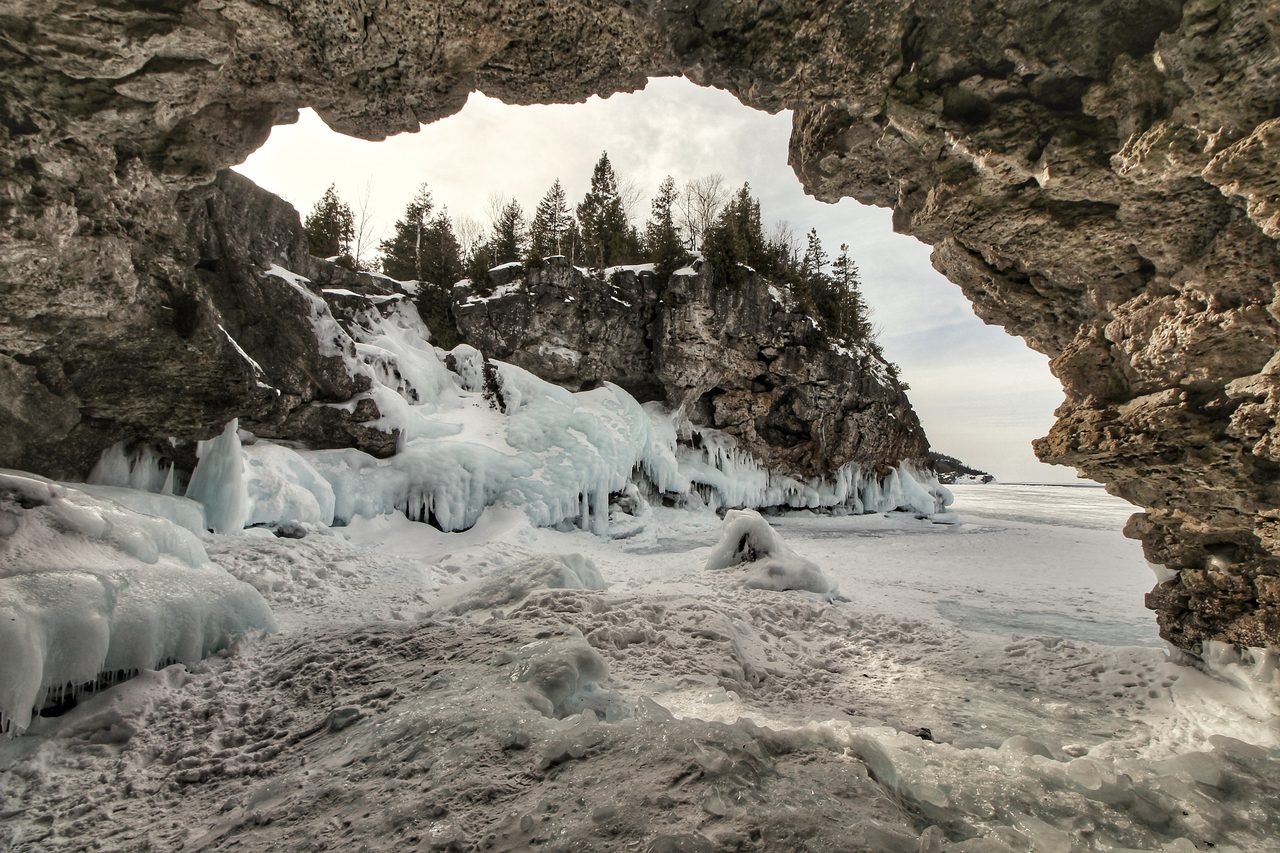 Turquoise water and limestone cliffs at The Grotto in Bruce Peninsula National Park