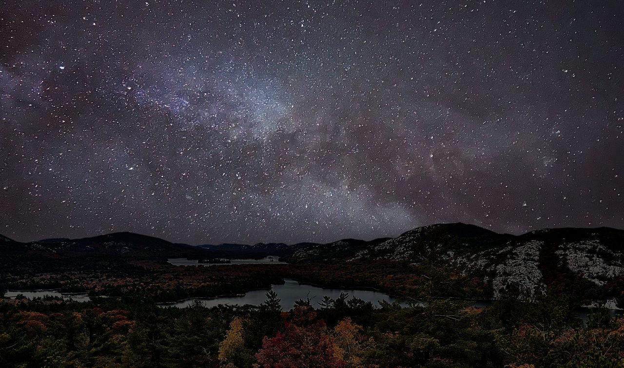 Milky Way arching over the white La Cloche Mountains in Killarney Provincial Park at night