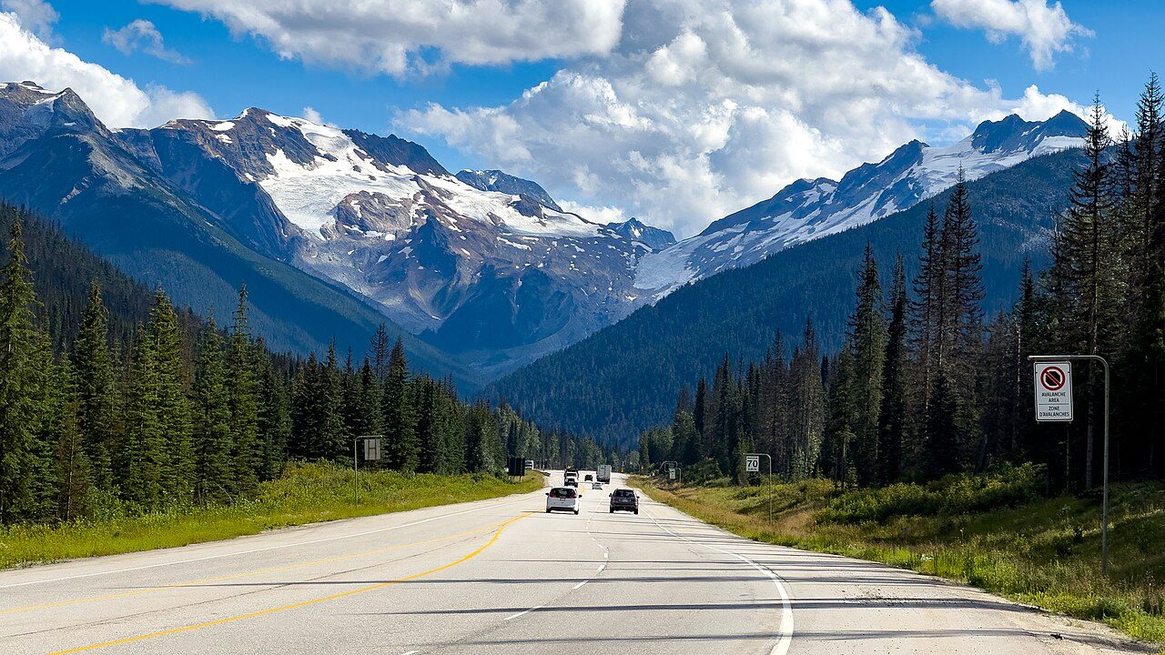 The Trans-Canada Highway crossing Rogers Pass in Glacier National Park, with glaciers and peaks above