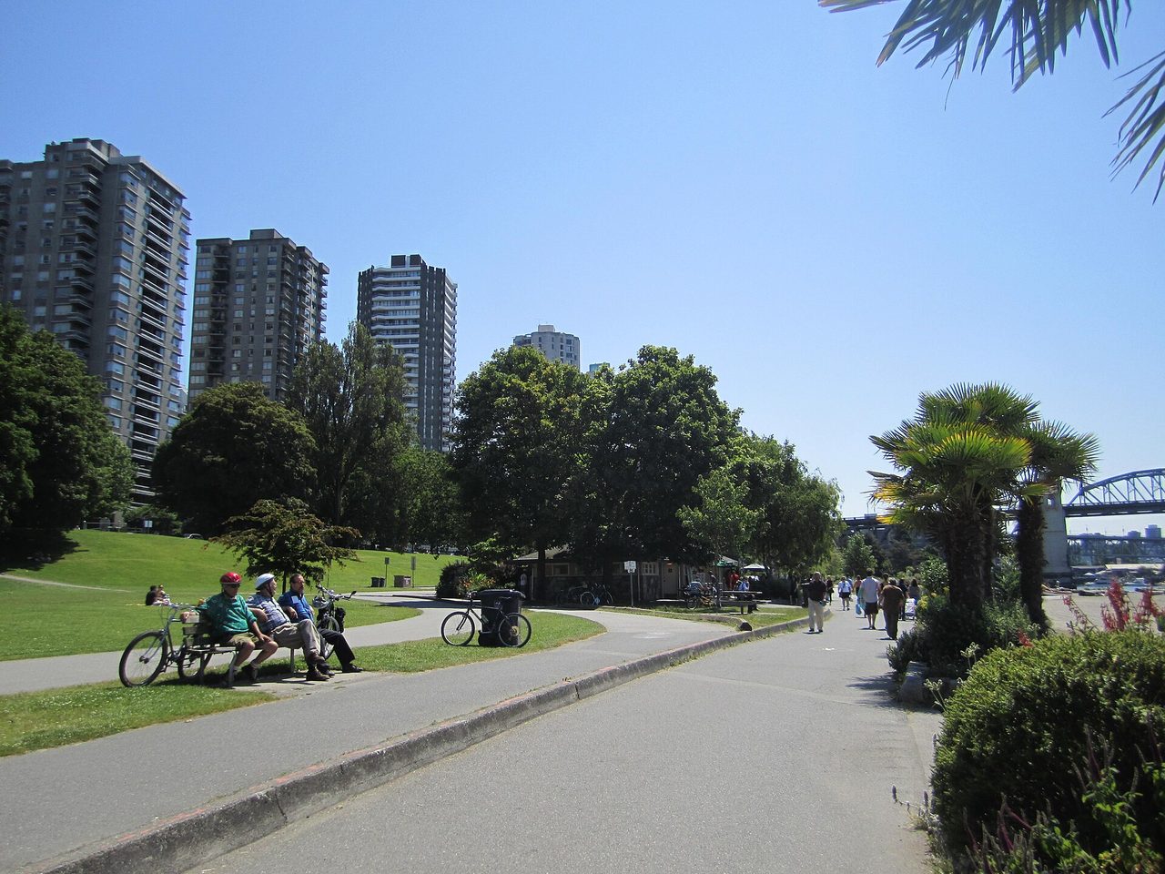 Vancouver on a clear summer day with mountains rising behind the city