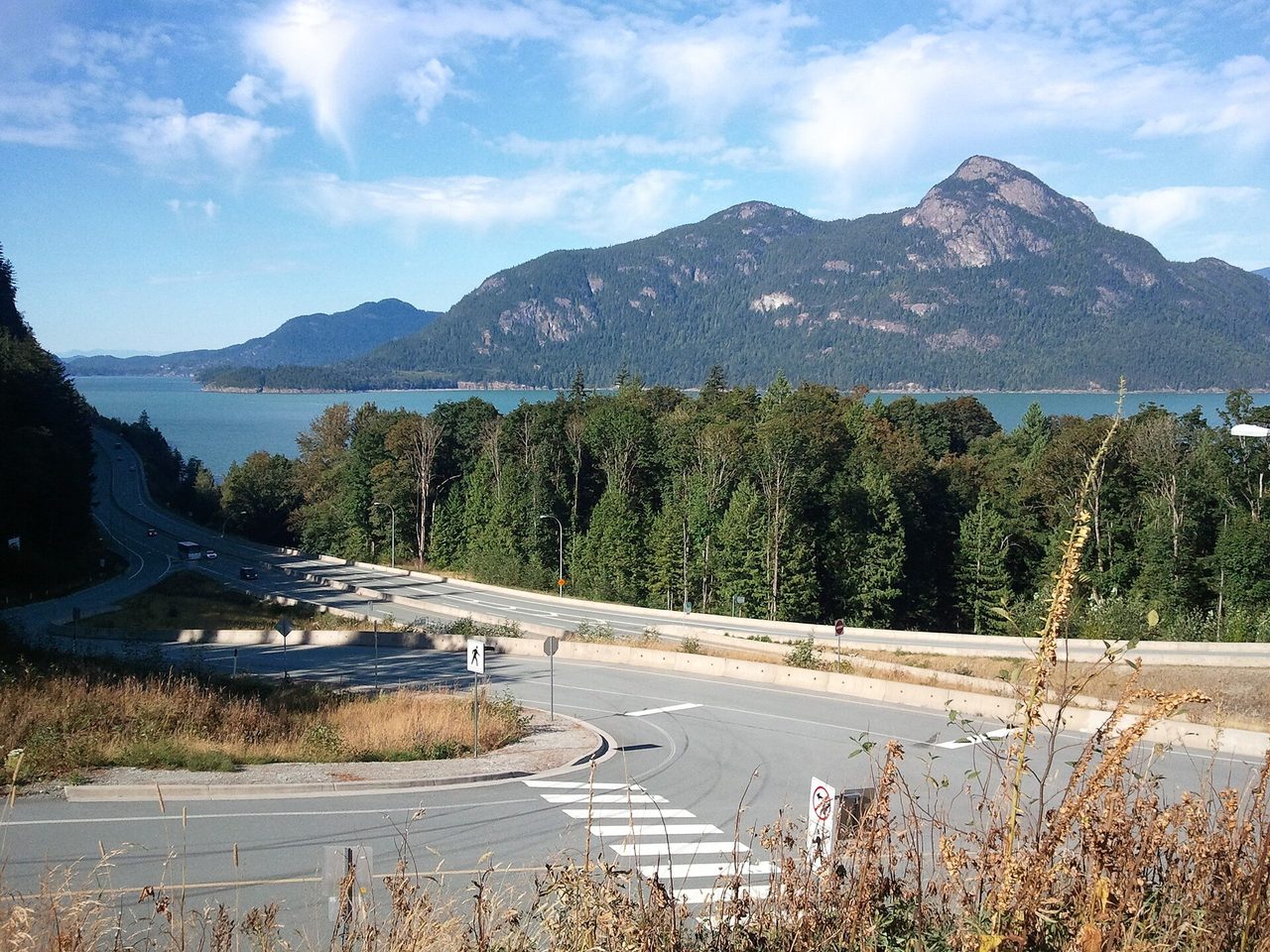 Sea to Sky Highway hugging the shoreline of Howe Sound near Porteau Cove, BC