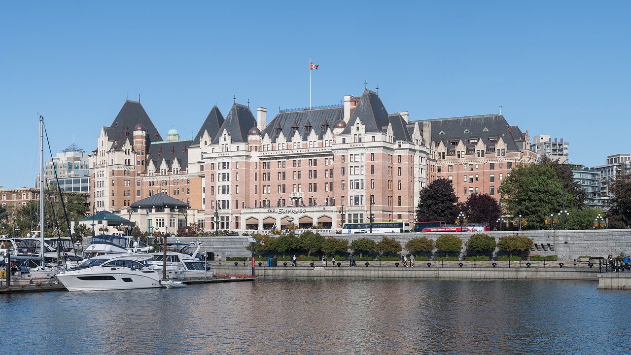 The Fairmont Empress hotel on Victoria's Inner Harbour at dusk