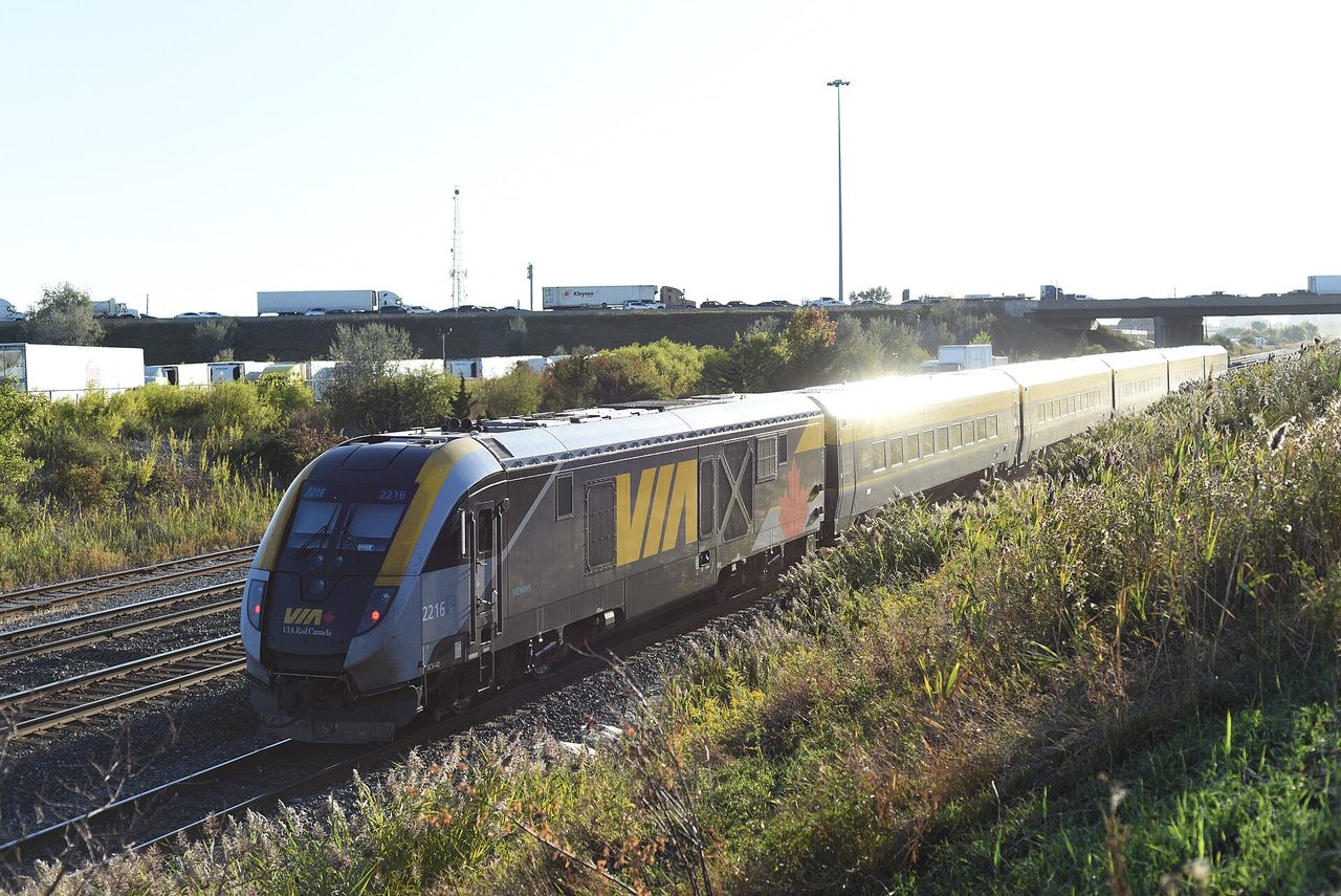 A VIA Rail passenger train waiting at the platform, ready to cross the country