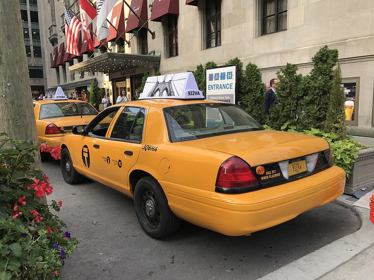 Taxis waiting outside the Fairmont Royal York hotel in downtown Toronto