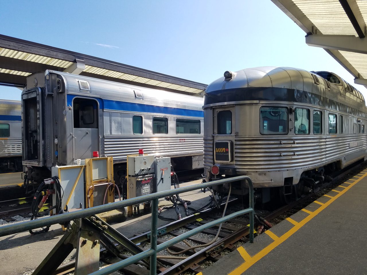 VIA Rail Skyline dome car and Park car coupled at Pacific Central Station in Vancouver before departure