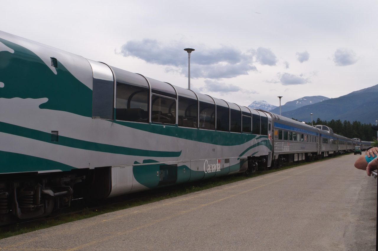 VIA Rail train stopped at the heritage railway station in Jasper, Alberta, gateway to the Rockies