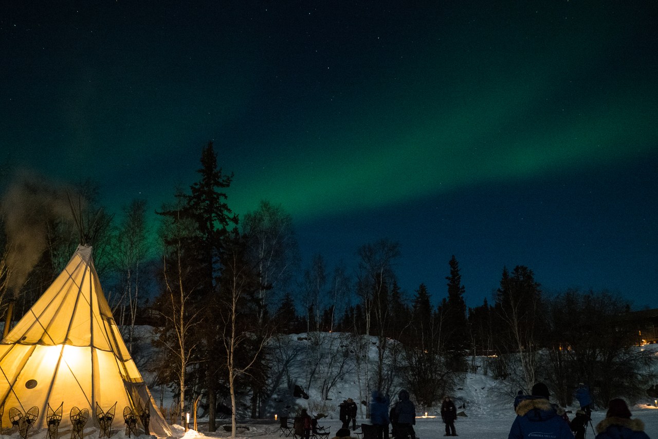 Green aurora borealis swirling over Yellowknife in the Northwest Territories