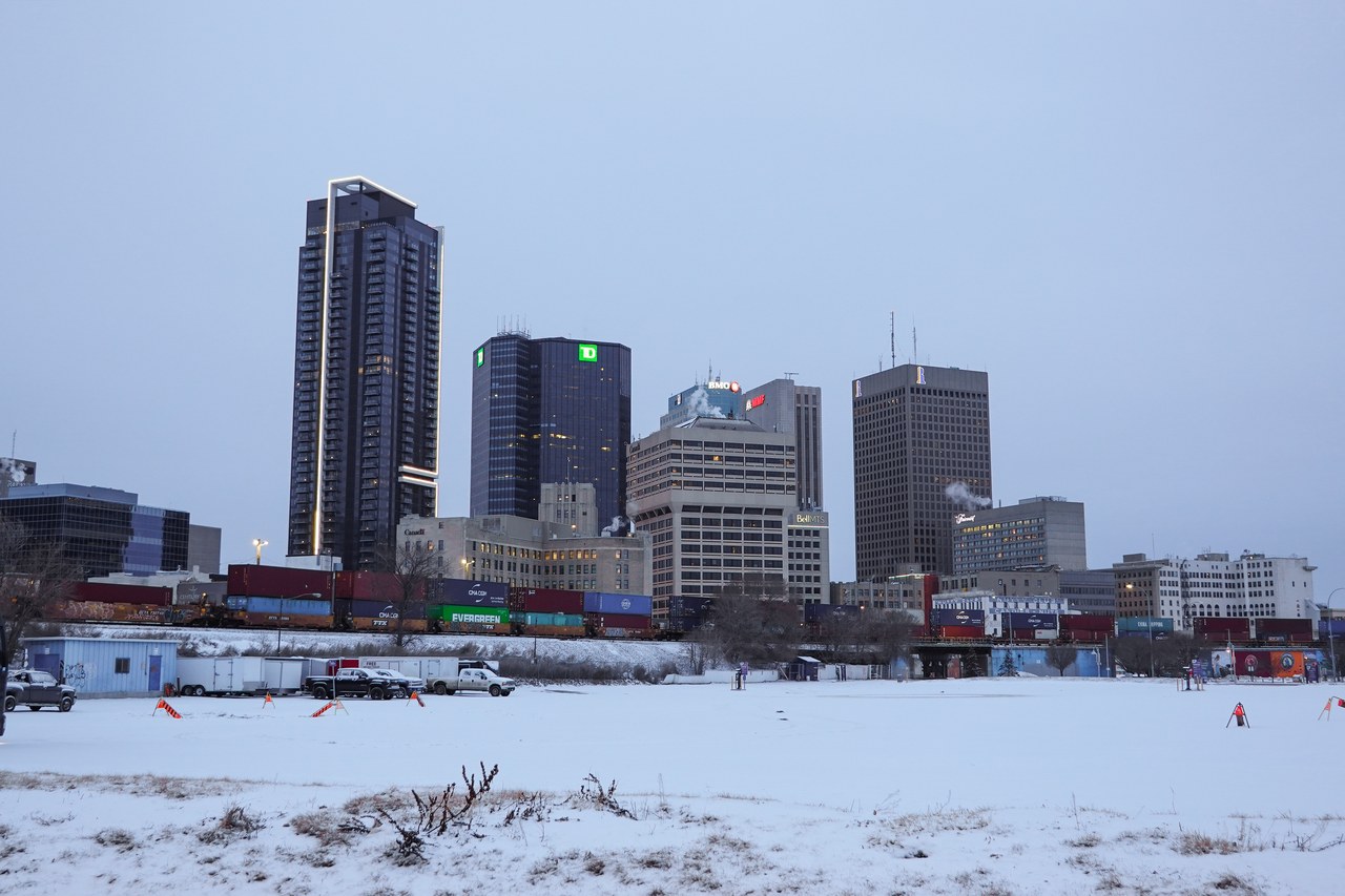 Downtown Winnipeg skyline under fresh snow, one of Canada's most affordable city destinations