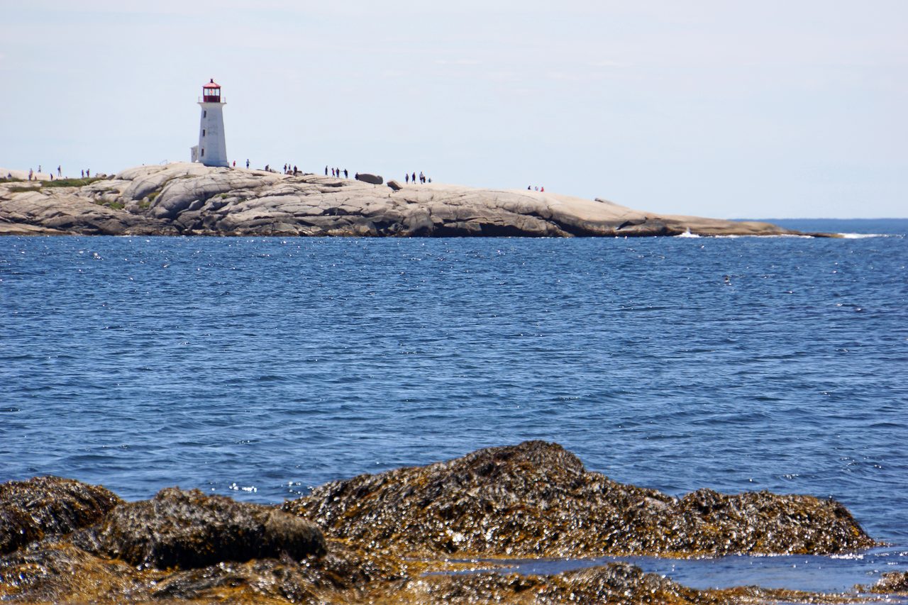 The lighthouse at Peggy's Cove, Nova Scotia, on wave-worn granite rocks
