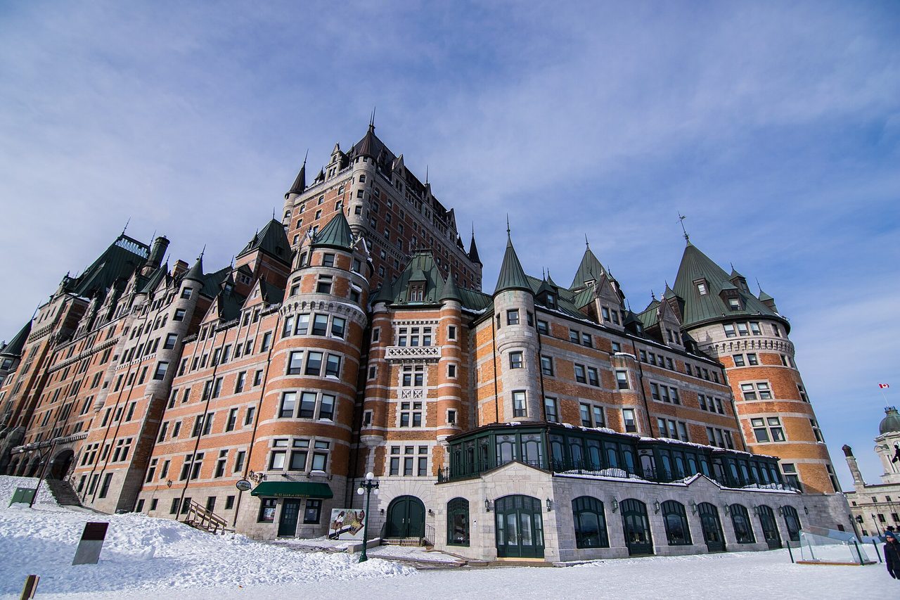 The Château Frontenac hotel in Quebec City surrounded by snow on a winter day