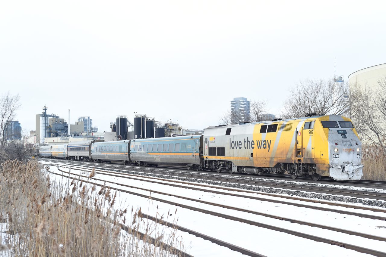 A VIA Rail passenger train crossing through Ontario countryside