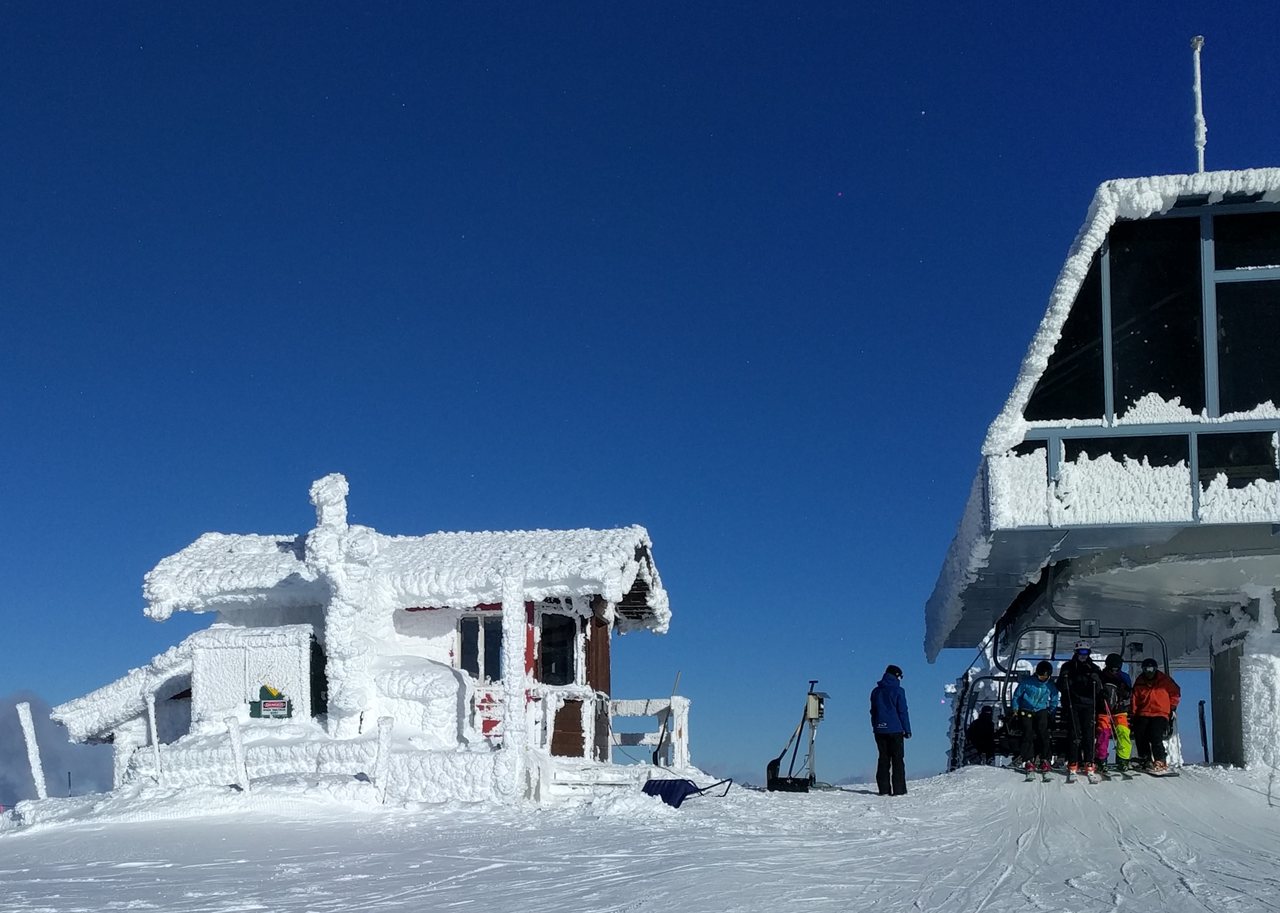Fresh snow piled on Whistler Peak in early winter