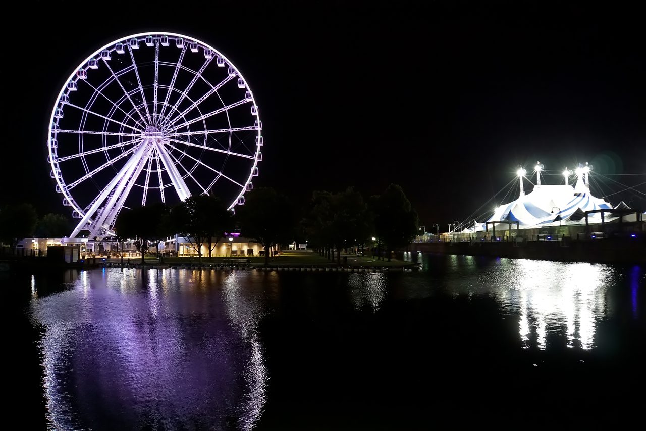 La Grande Roue observation wheel lit up at night in Montreal's Old Port