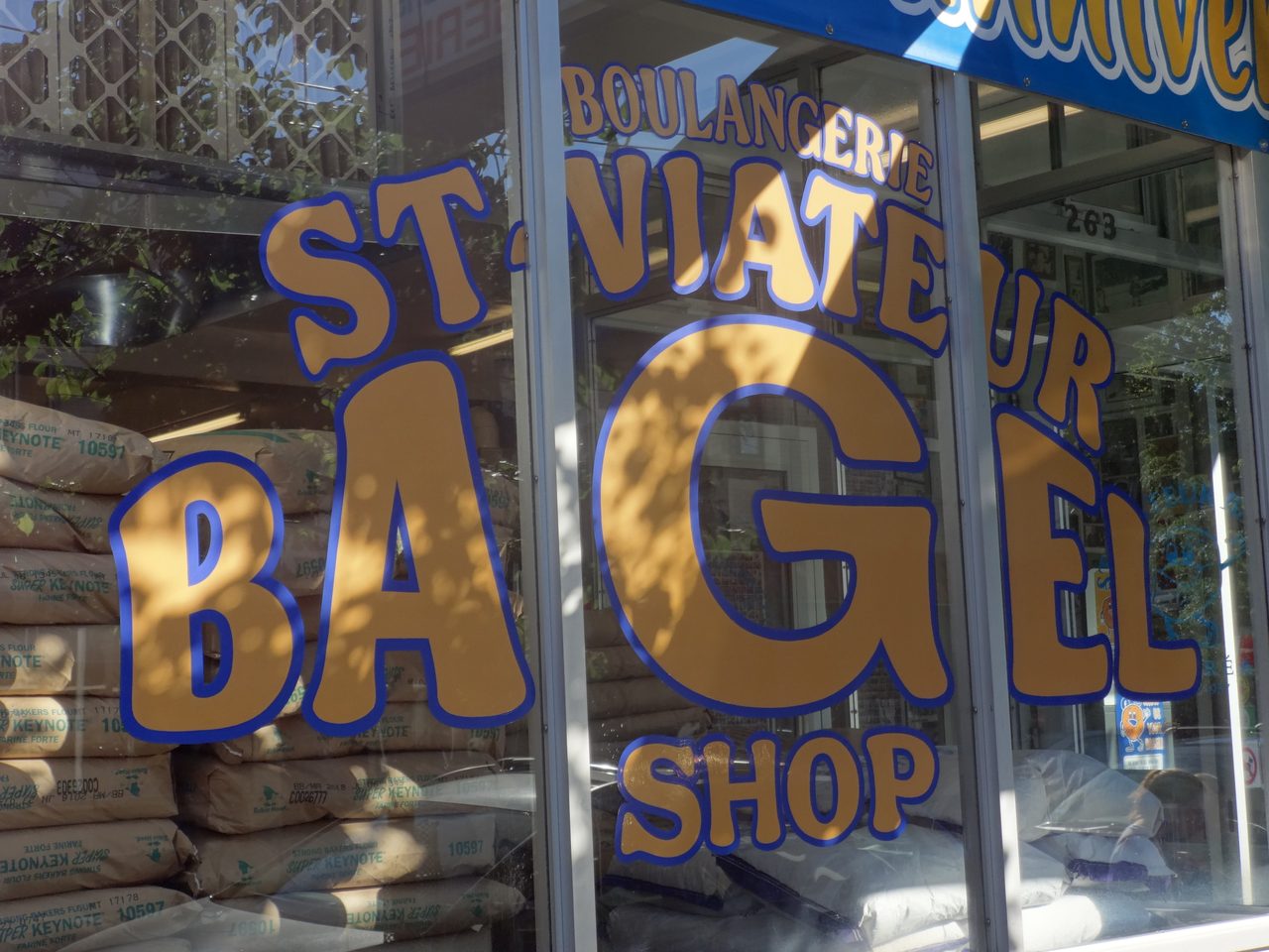 Fresh wood-fired sesame bagels at St-Viateur Bagel in Mile End