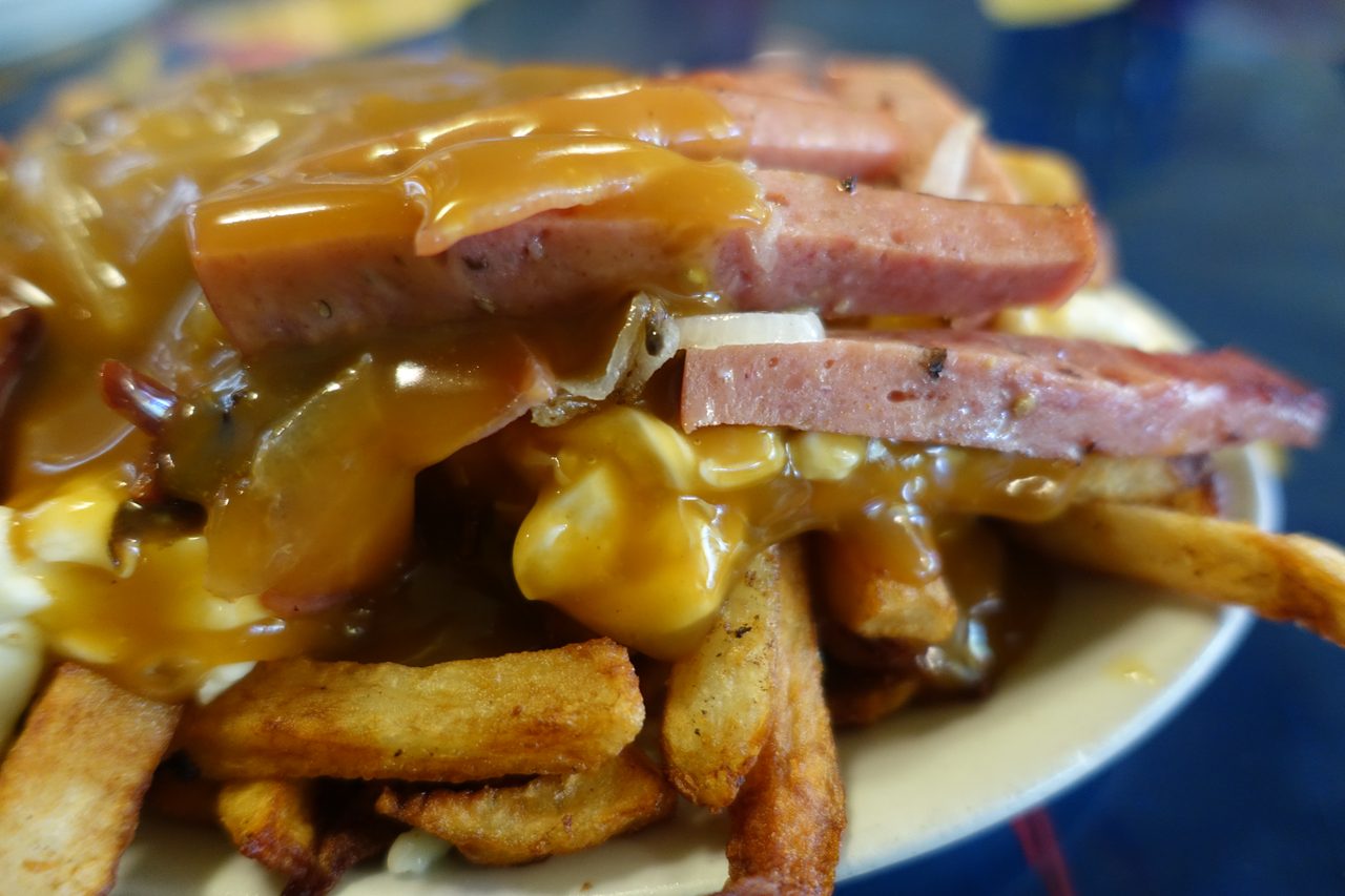 Classic poutine with cheese curds and hot gravy at La Banquise in the Plateau
