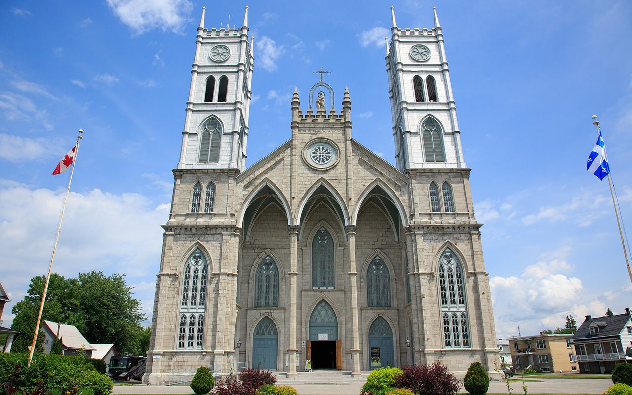 Stone church with twin towers at Sainte-Anne-de-la-Pérade along the Chemin du Roy