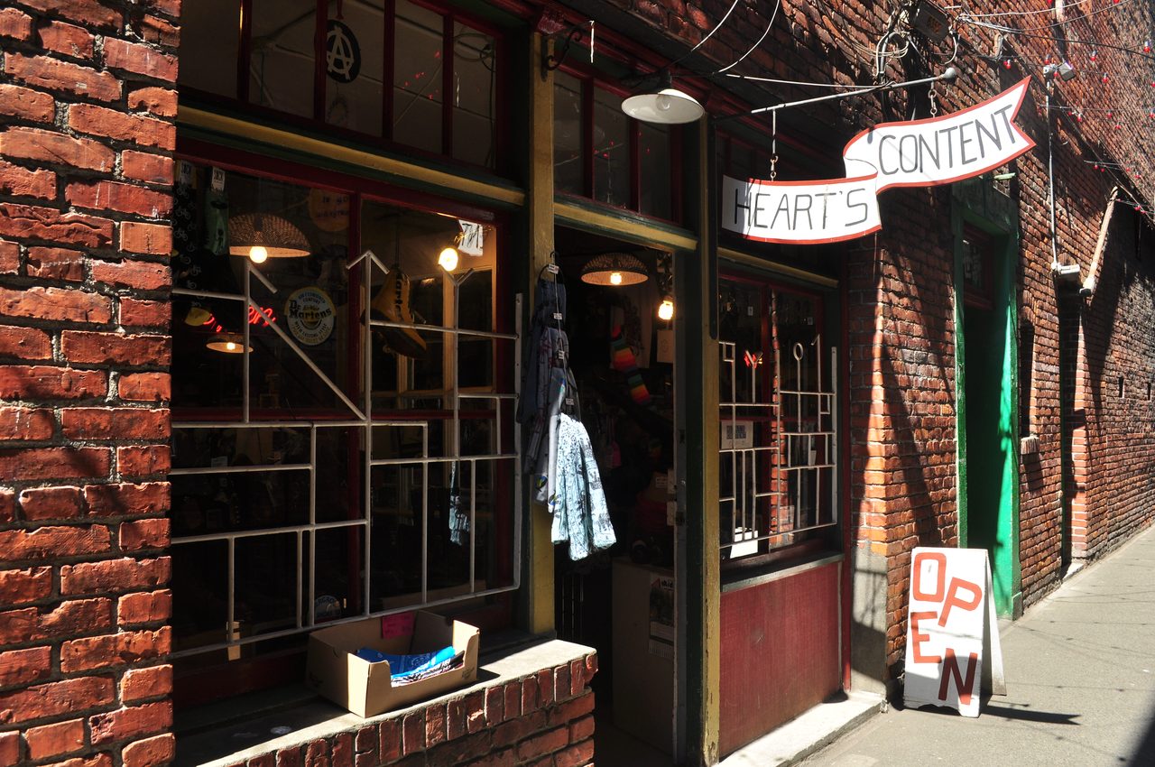 The narrow brick lane of Fan Tan Alley in Victoria's historic Chinatown