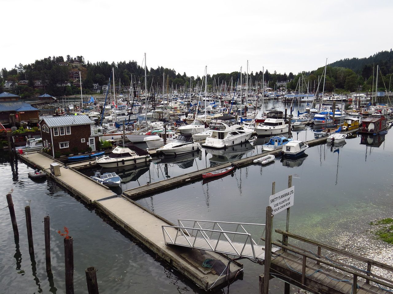 A marina packed with sailboats and fishing boats on British Columbia's Sunshine Coast