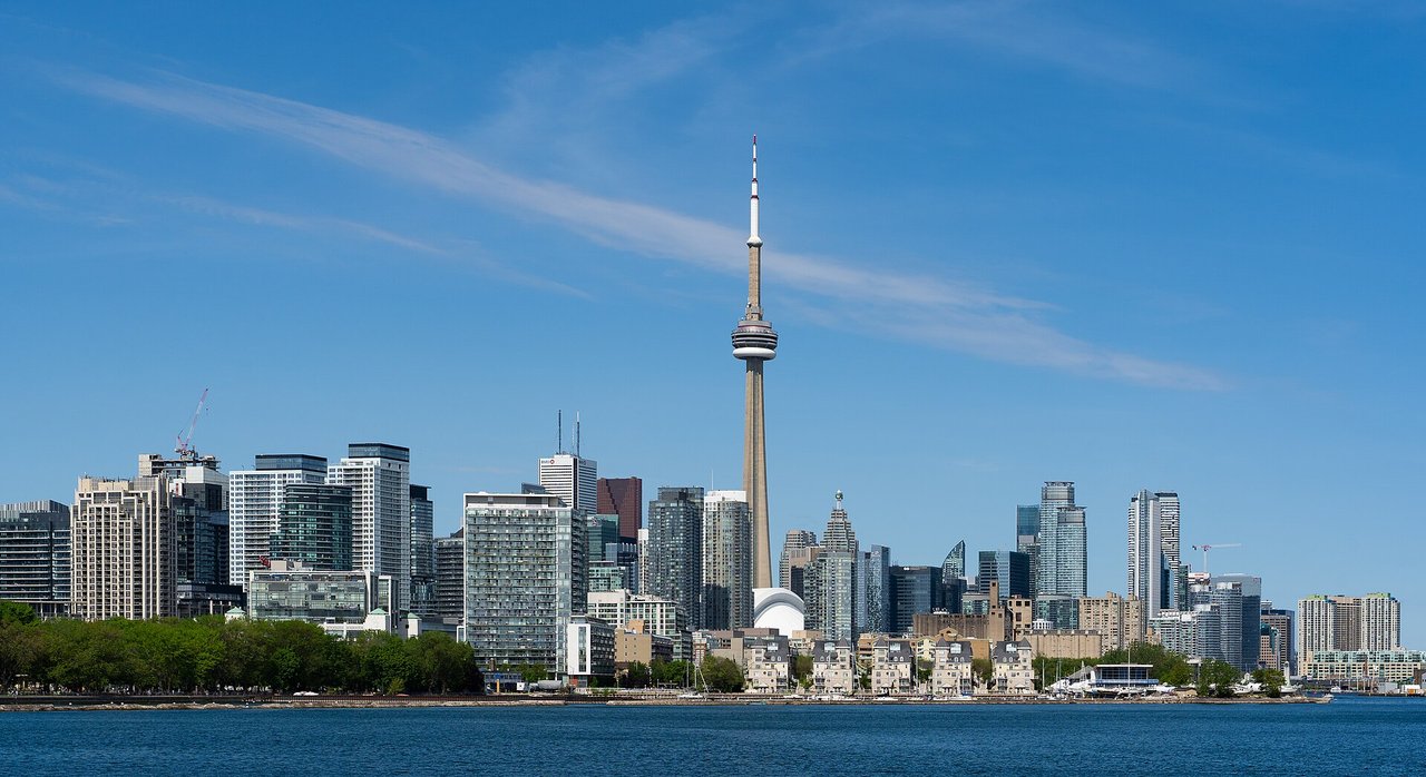 Toronto skyline with the CN Tower rising over Lake Ontario, viewed from Trillium Park